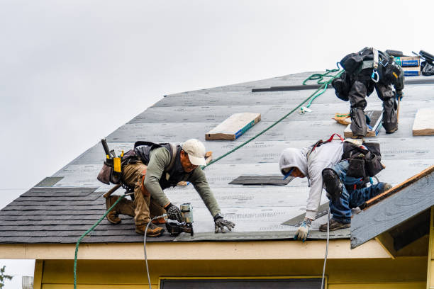 Professional Gutter Installation technician working in Nutting Lake, MA